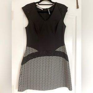 Comfortable casual dress with flattering detail on the hips.